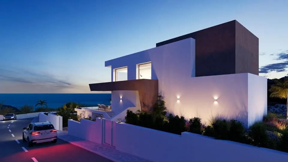 Neubau-Villa mit Meerblick am Abend